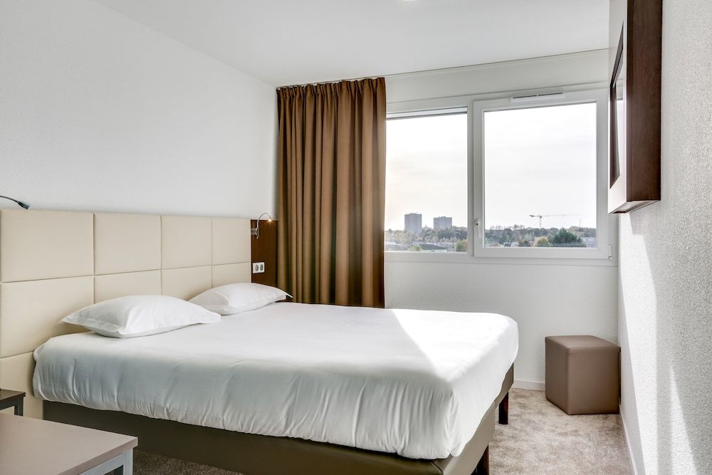 Balladins Caen Memorial 3 estrelas em Saint-Chamond