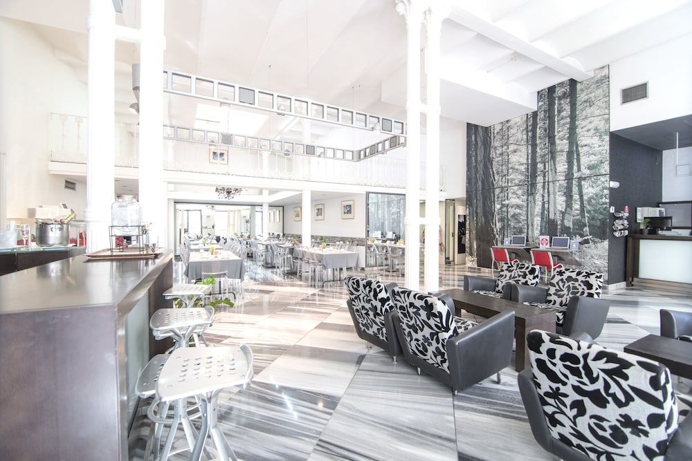 Petit Palace Plaza de la Reina 3