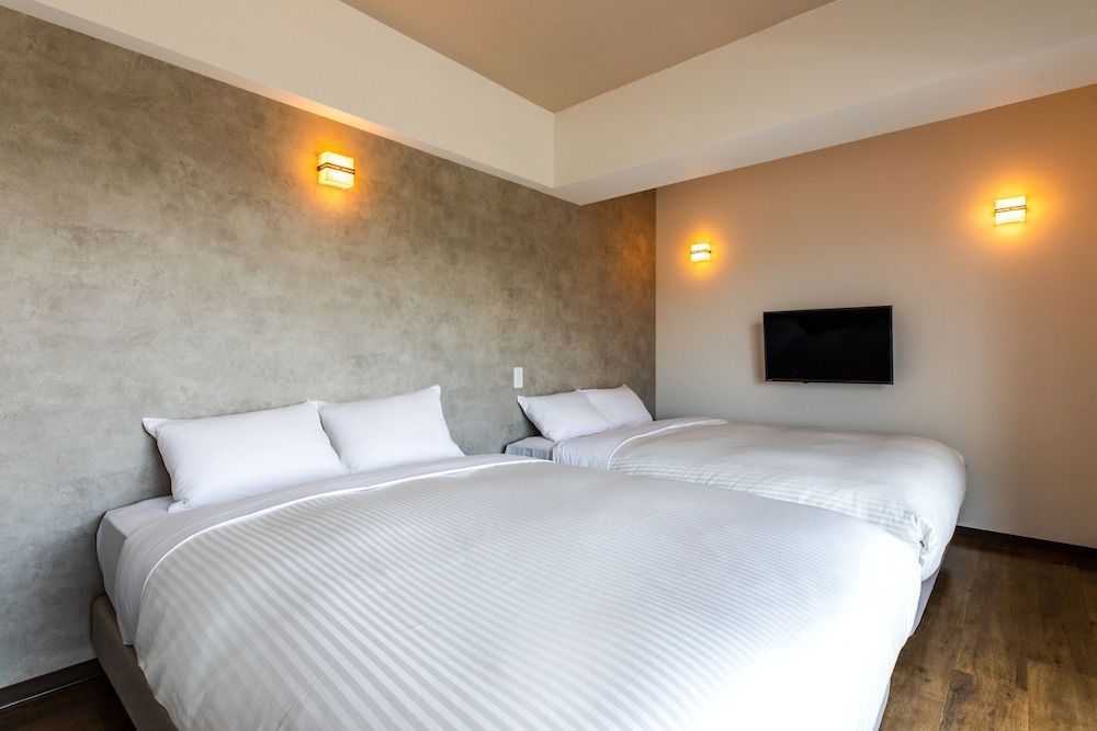 Mr.KINJO in front of Manza Beach 3