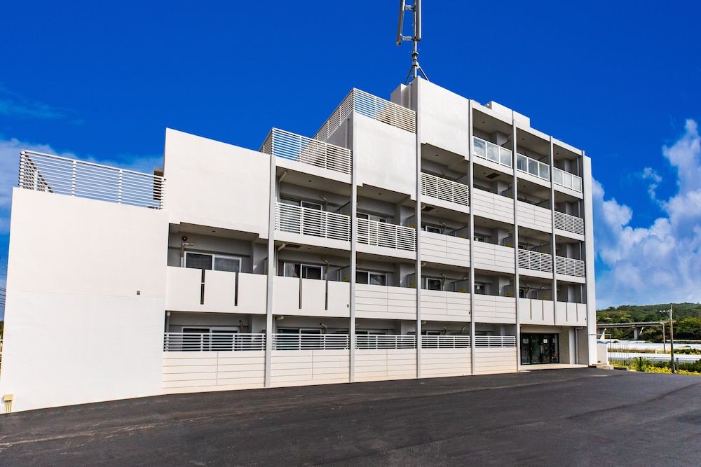 Mr.KINJO in front of Manza Beach