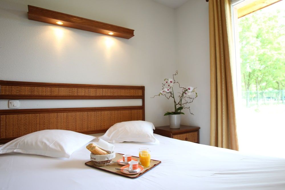 Vacancéole - Résidence le Domaine du Lac 2