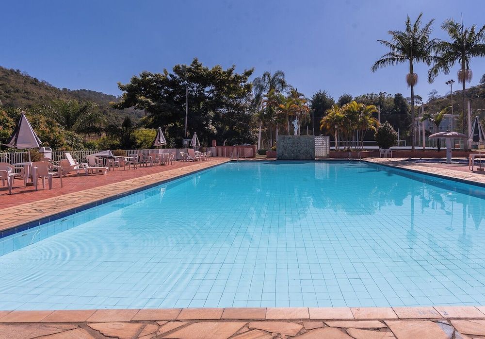 Cavalinho Branco Flat Para 4 Pessoas c Piscina -1 estrelas em Águas de Lindóia