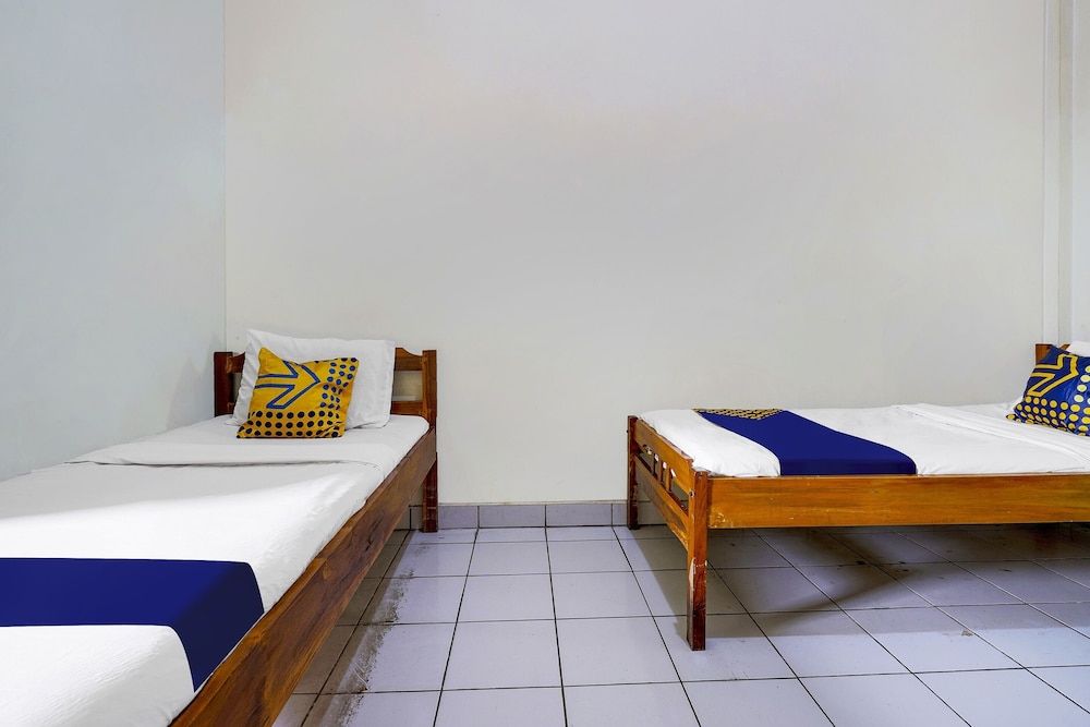 SPOT ON 91064 Wisma Lec Syariah 2