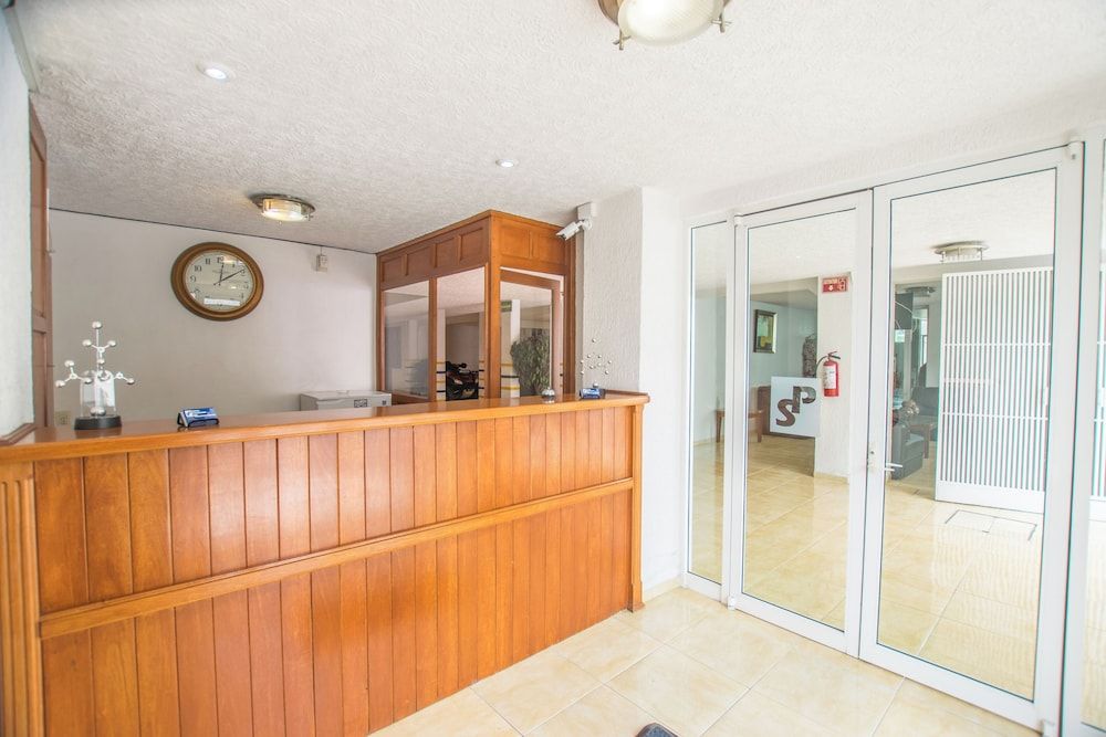 Suites Poliforum Inn 3