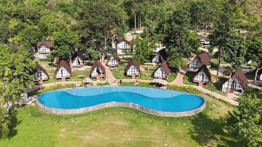 WelcomHeritage Tarangi Ramganga Resort, Corbett 5 estrelas em Marchula