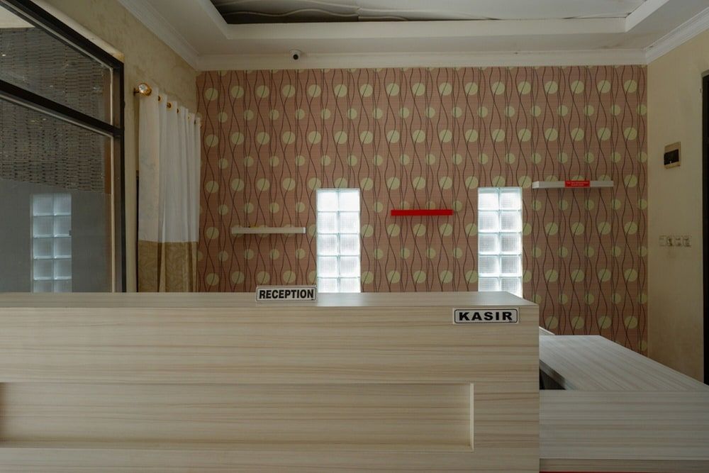 RedDoorz near Millenium Waterpark Palu 3