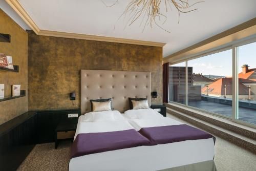 Corso Hotel Pécs 4 estrelas em Pécs