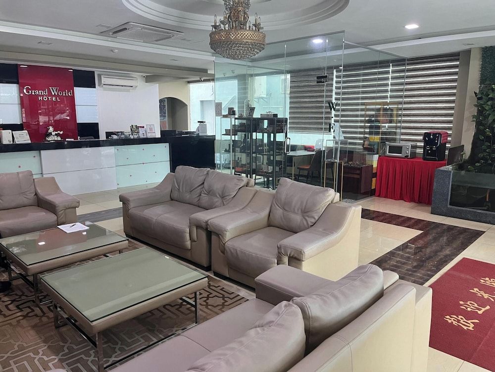 Capital O 91074 Grand World Hotel 2