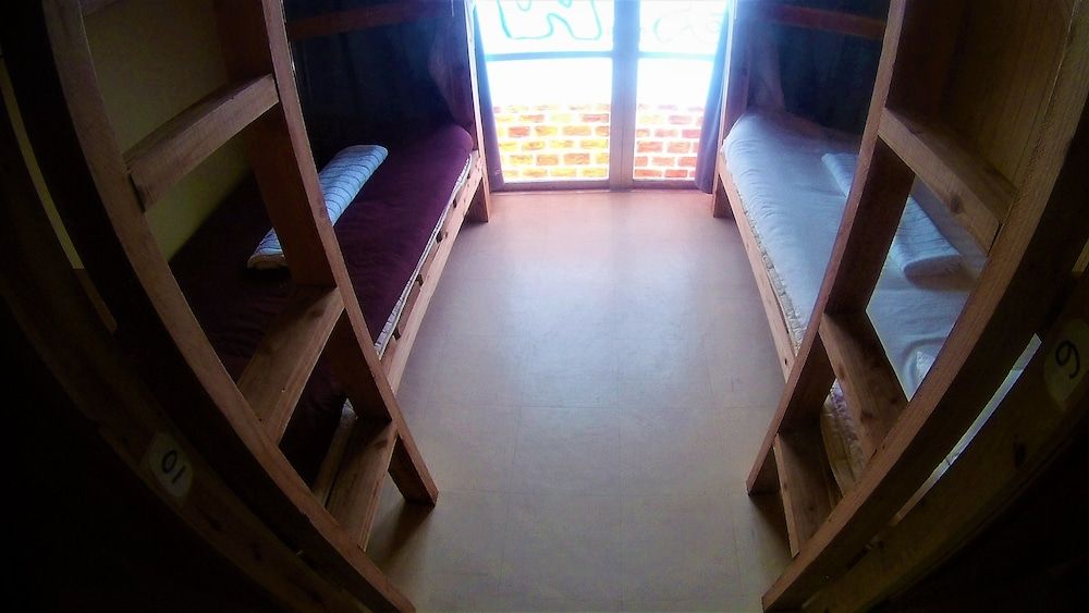 Guesthouse Nandeyanen - Hostel -1 estrelas em Motobu
