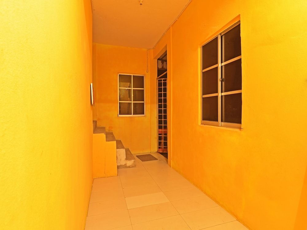 OYO 90664 Rabi Hotel 1