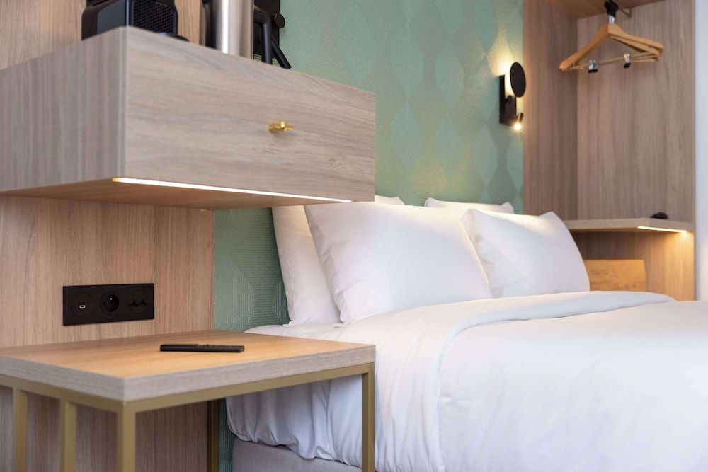 Kyriad Prestige Asnieres-sur-seine 4 étoiles à Asnières-sur-Seine