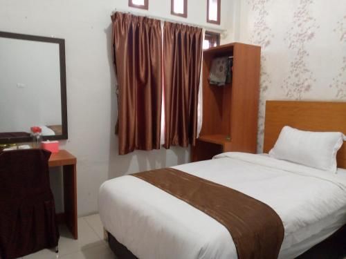 Hotel Belangi Syariah Taakengon Mitra RedDoorz 1