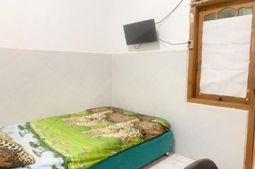 OYO 90782 Juwingan Syariah 3 2 estrelas em Surabaia