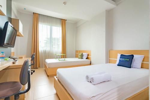 Urbanview Hotel Syariah Dapen Pontianak by RedDoorz 3