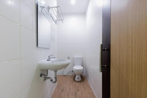Sans Hotel Rumah Kita Daan Mogot by RedDoorz 3