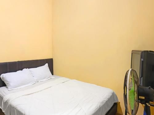 SPOT ON 92569 Anto Homestay SyariahNearPelabuhan Feri Harbor Bay 2 estrellas en Batam Centre