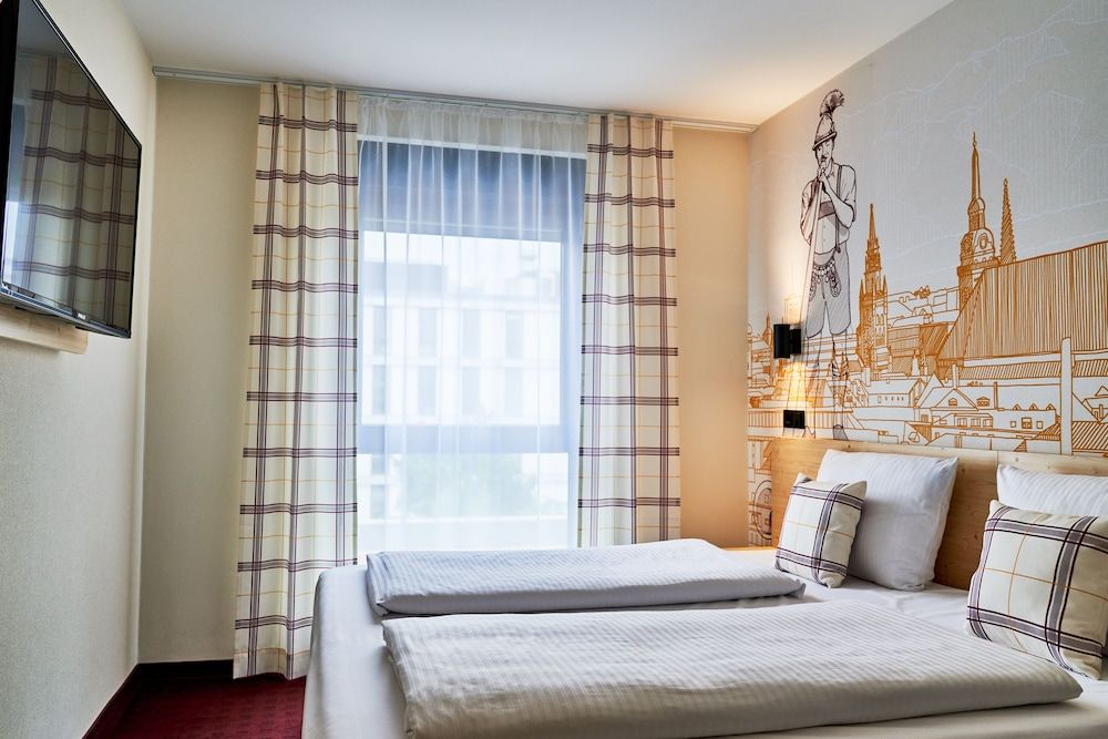 McDreams Hotel München Messe -1 estrelas em Feldkirchen