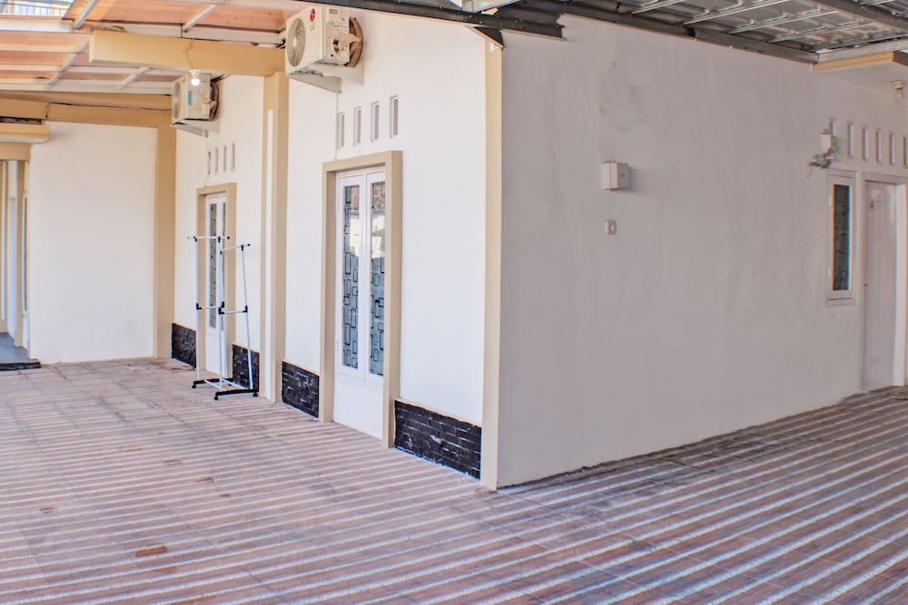 Spot On 91504 De Vila Ungu Syariah 2