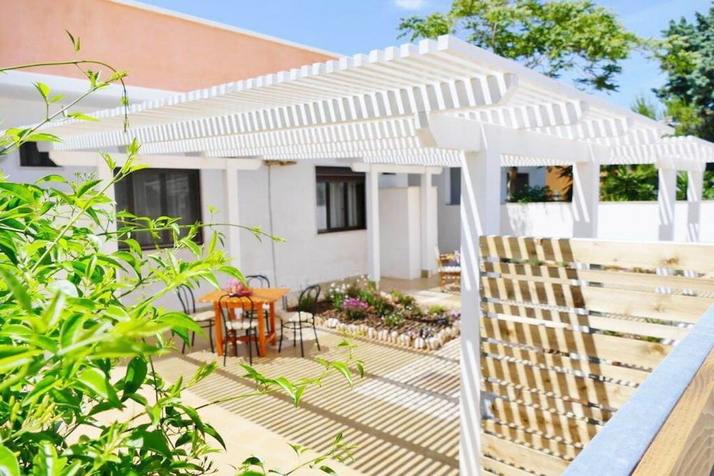 Punta Prosciutto Bed -1 estrelas em Torre Lapillo