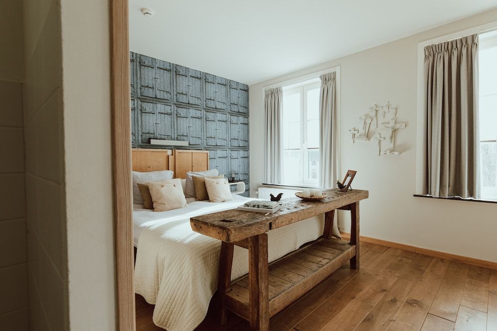 Au Nom De Dieu -1 estrelas em Dilsen-Stokkem