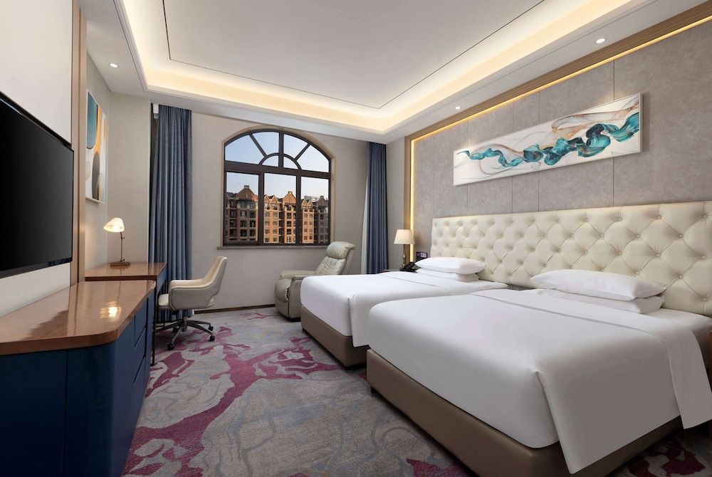 Ramada by Wyndham Zhumadian West Station -1 estrellas en Zhumadian