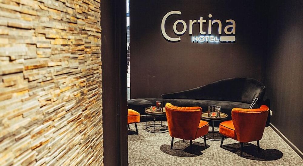 Cortina Hotel 4 estrellas en Wevelgem