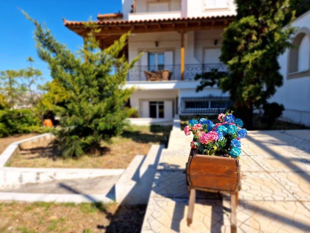 The Mirador Boutique Villa With Scenic Sea View -1 estrellas en Porto Rafti