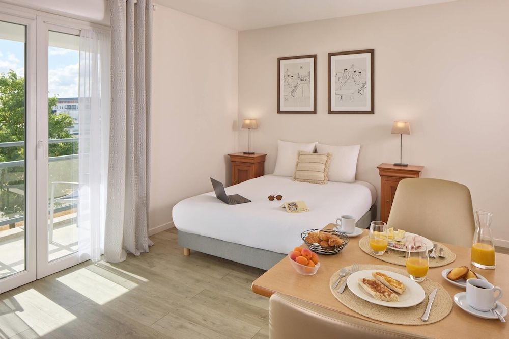 Quality Aparthotel Portes de Rennes -1 estrellas en Bruz