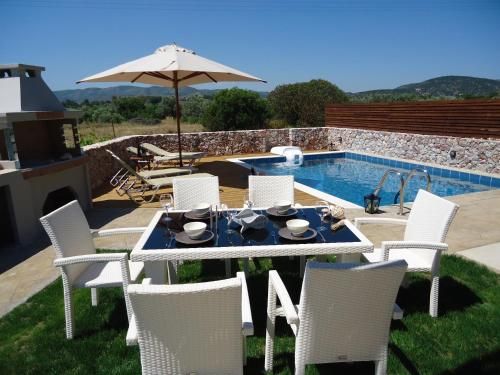 Next to Haraki beach , taverns bars & 10 to Lindos 2