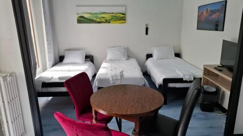 Chambre quadruple -1 estrellas en Lully