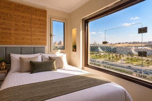 Pyramuse Inn 4 estrellas en Kafrat Naşşār