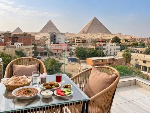 Pyramids Homeland Inn 4 estrellas en Nazlat as Sīsī